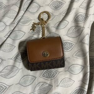 Brown Michael Kors AirPod pro case with button. Brand new-Never used!